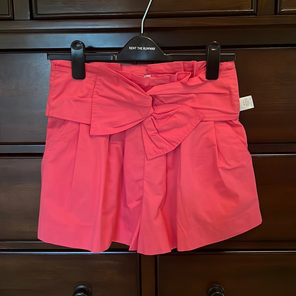 Pink pleated shorts